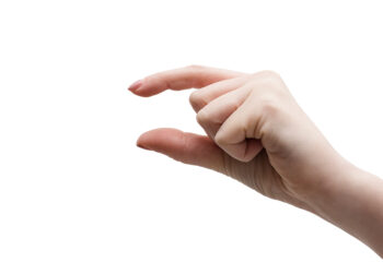 Image shows hand making gesture symbolic of small.