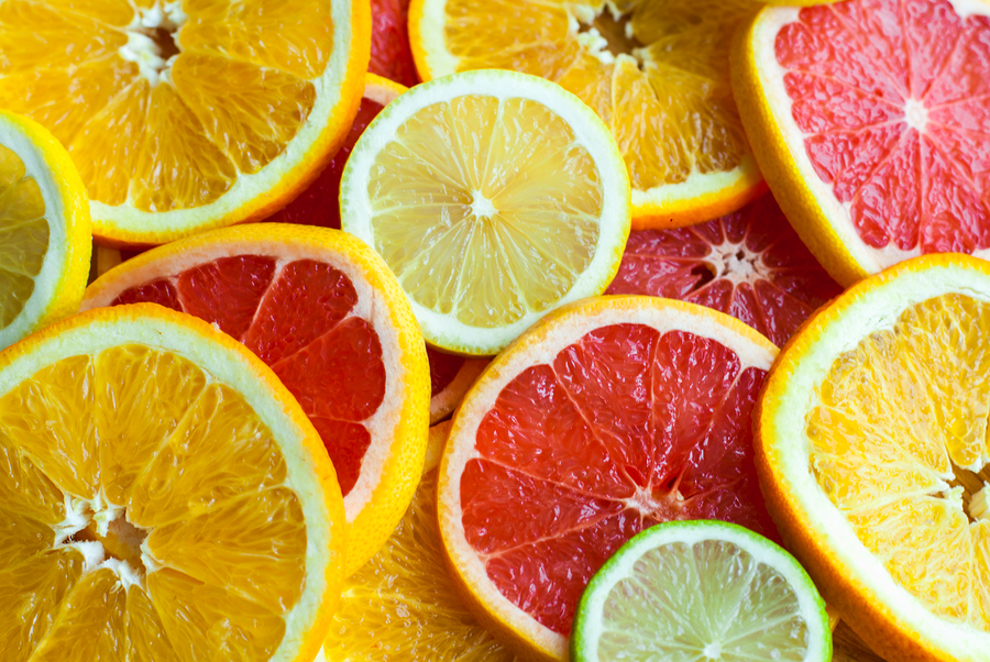 Slices of different citrus fruits. 
