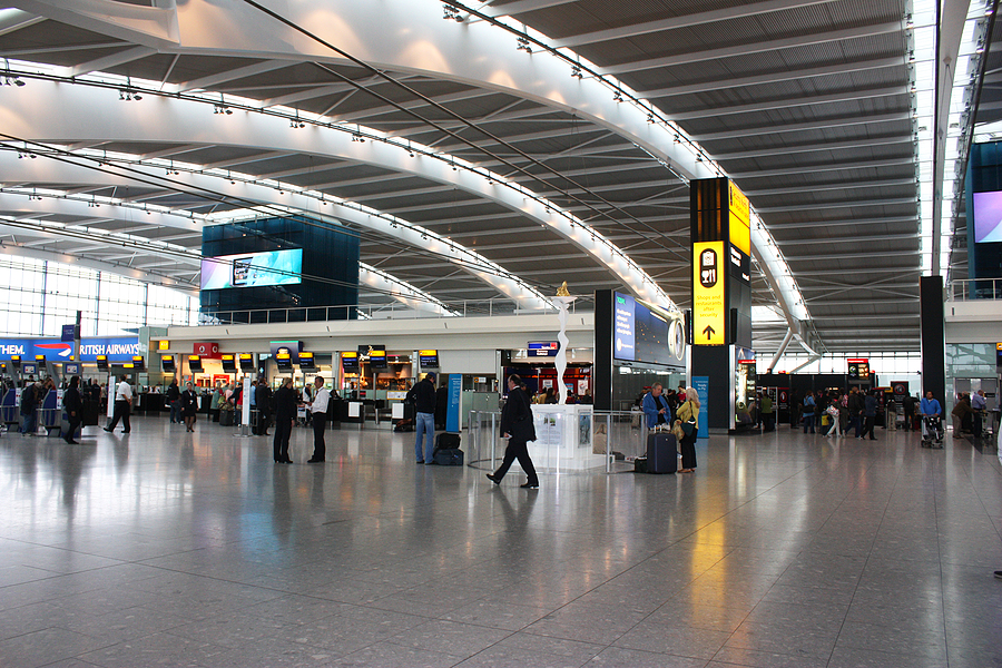 Travelers in London Heathrow Airport.