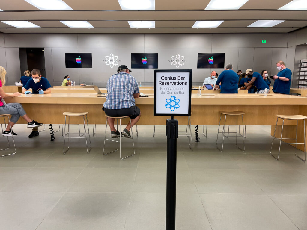 Customers at Apple Store Genius Bar