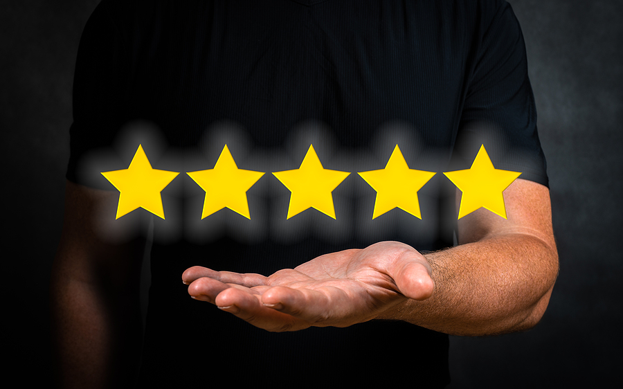 Hand offering 5-star customer rating