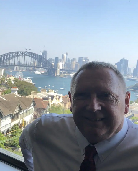 A selfie of Paul with Sydney harbor in the background