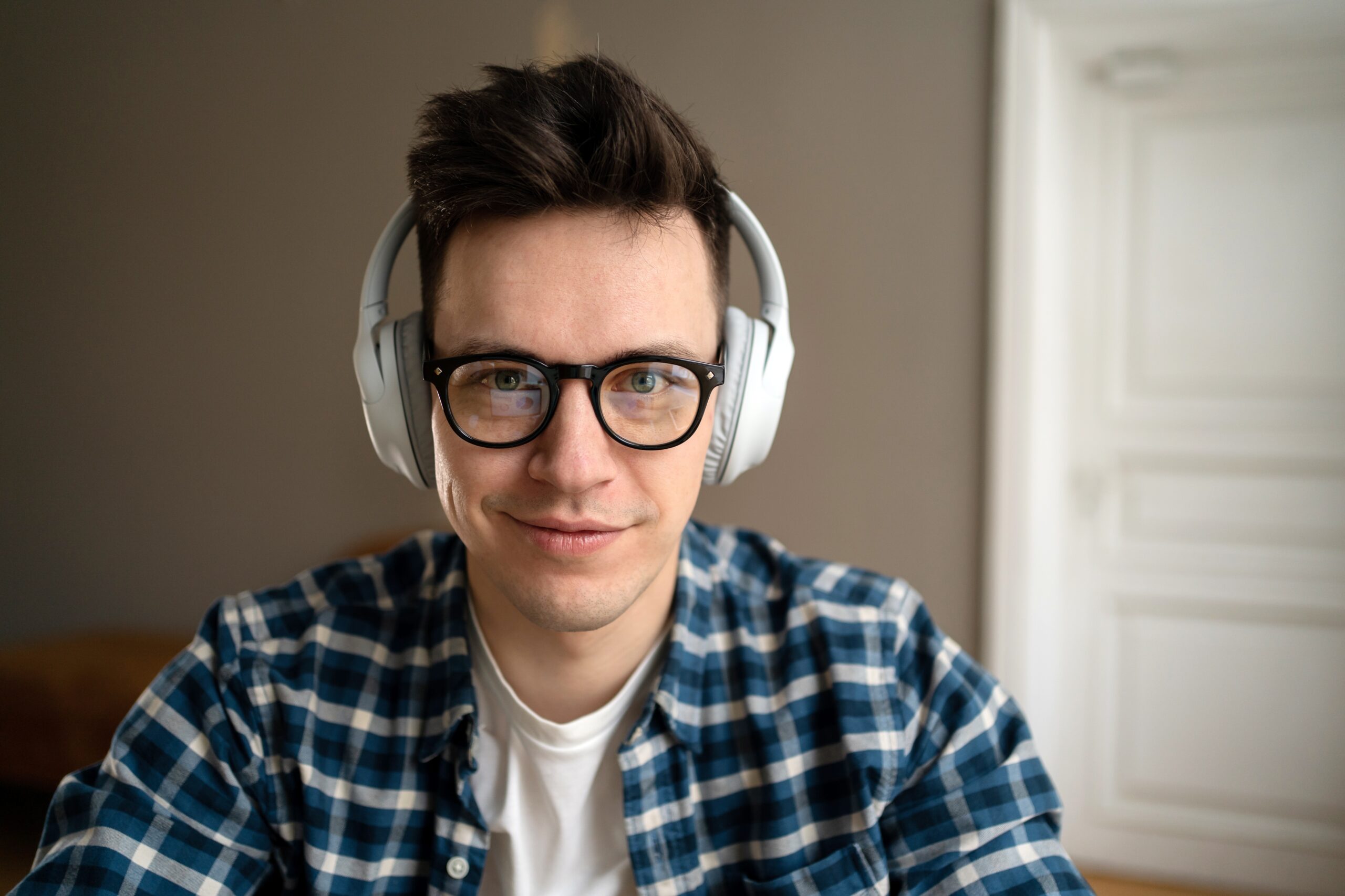 Man with headphones enjoying new season of CML content